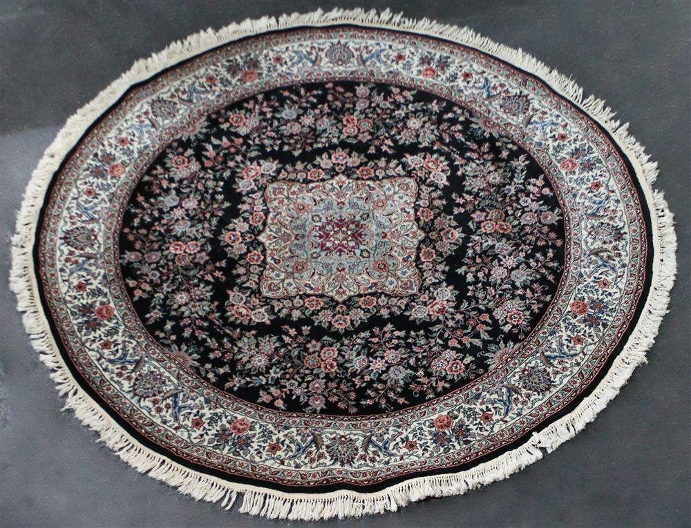 Appraisal: CIRCULAR ORIENTAL WOOL RUG WITH FRINGE PROBABLY MADE IN CHINA