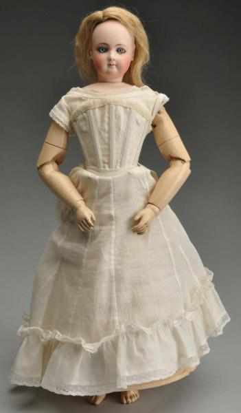 Appraisal: French Jumeau Poup e Lady Doll Description Bisque socket head