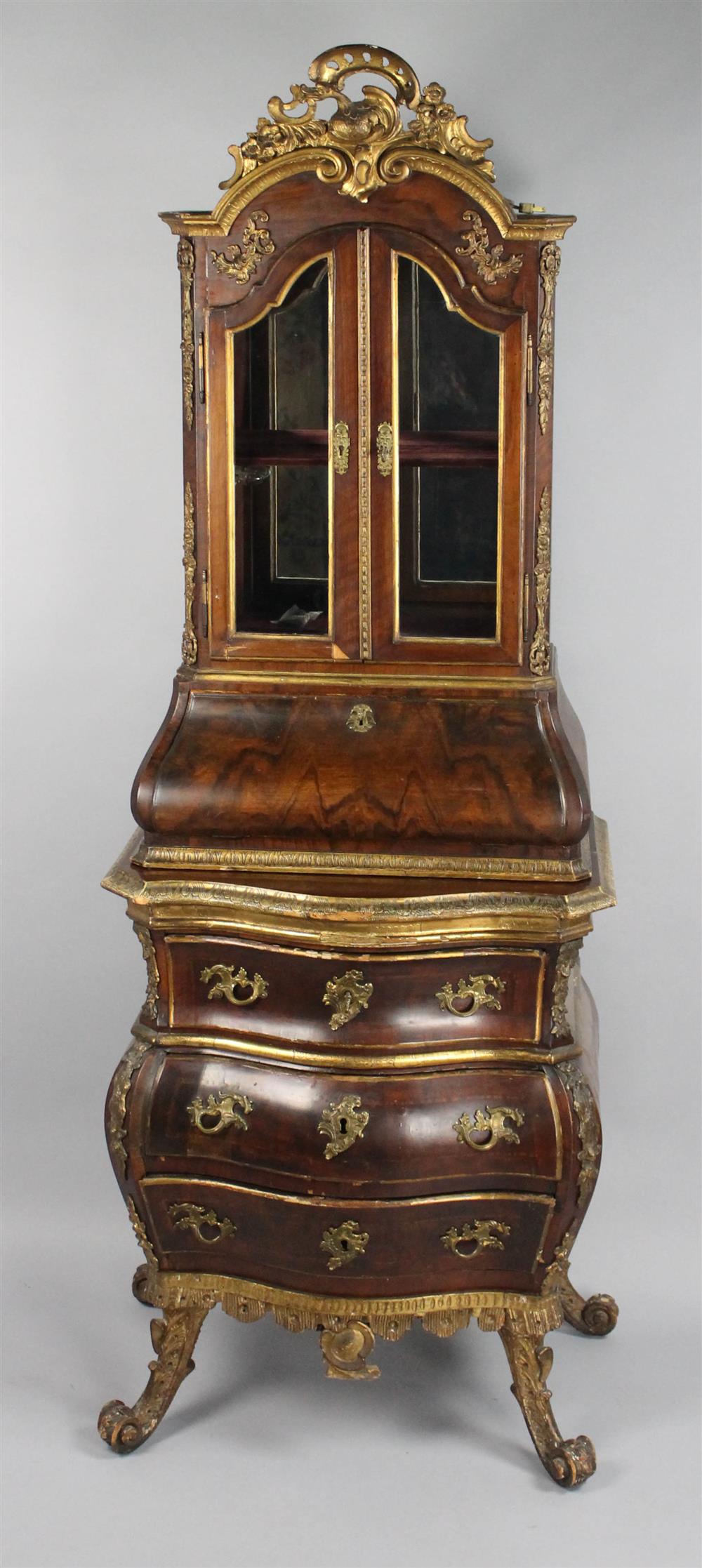 Appraisal: LOUIS XV STYLE FRUITWOOD AND GILT BOMBE SECRETARY in two