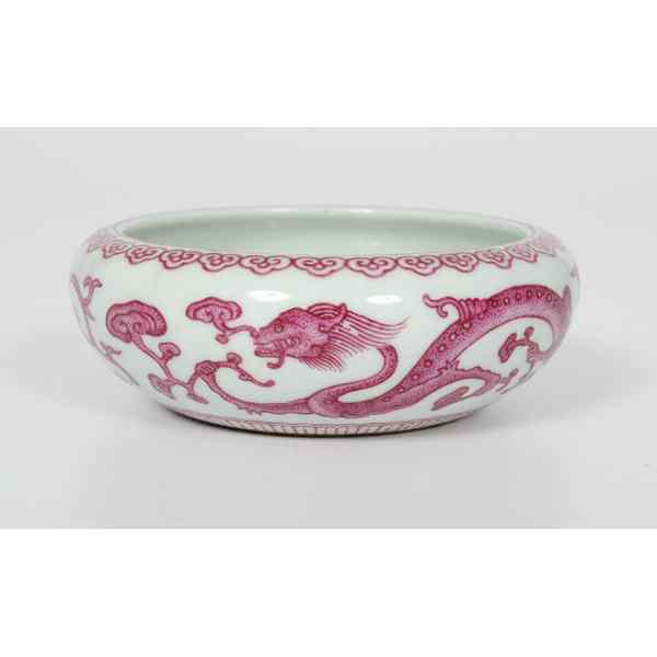 Appraisal: Chinese Dragon Bowl Chinese A porcelain low bowl with a