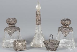 Appraisal: Three silver mounted glass bottles together with two filigree dresser