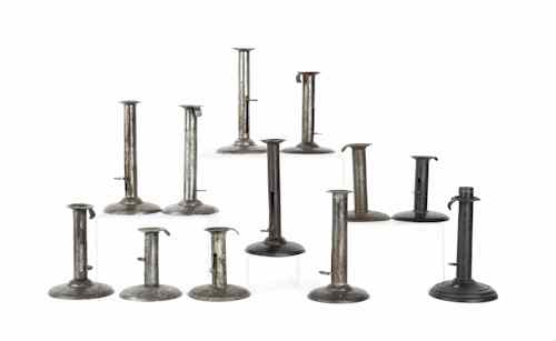 Appraisal: Twelve tin hogscraper candlesticks th c tallest - h