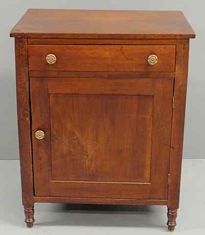 Appraisal: Sheraton cherry cabinet c with a single drawer above a