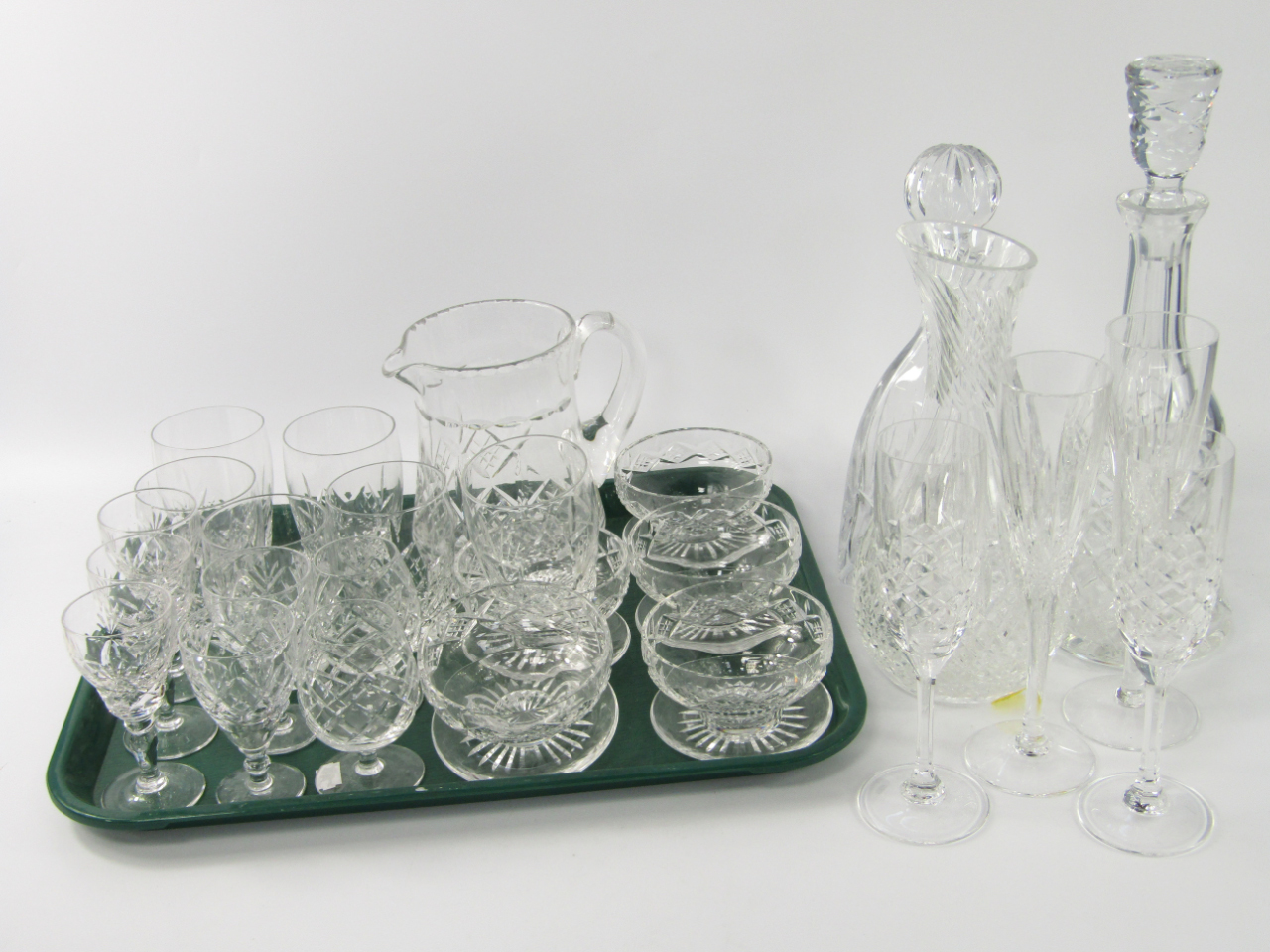 Appraisal: Cut table glassware including two decanters and stoppers carafe water