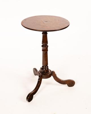 Appraisal: An early th Century oak tripod table with circular top