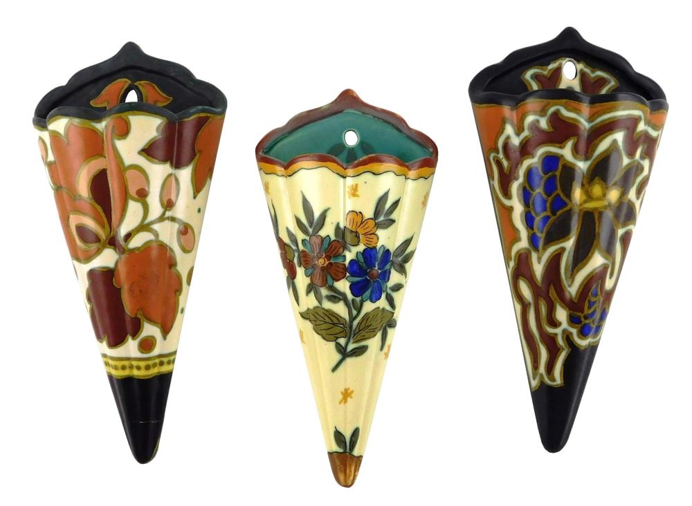 Appraisal: ART POTTERY Gouda three wall pocket flower vases in three