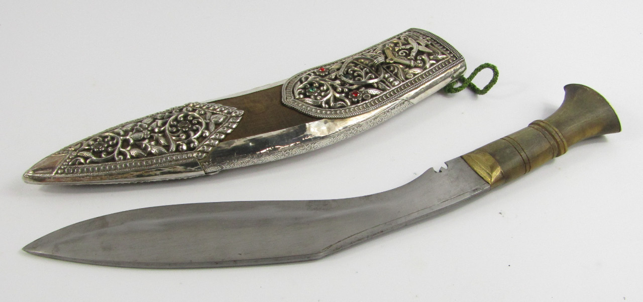 Appraisal: A Gurkha Kukri with a horn handle velvet bound sheath