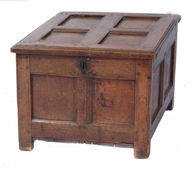 Appraisal: An th Century oak box coffer with panelled lid and