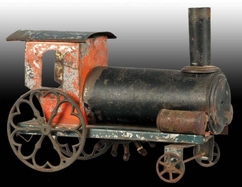 Appraisal: Fallows Early American Tin Toy Floor Train Engine Description Heart