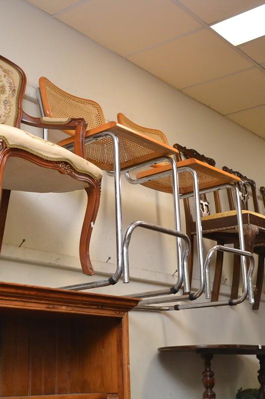 Appraisal: A PAIR OF RATTAN AND CHROME BAR STOOLS A PAIR