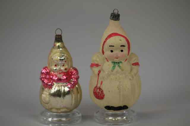 Appraisal: TWO BABY IN BUNTING GLASS ORNAMENTS Germany two blown glass