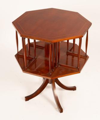 Appraisal: An octagonal revolving bookcase the top with cable stringing cm