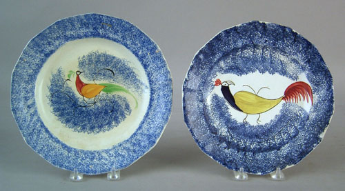 Appraisal: Two blue spatter plates th c with peafowl decoration dia