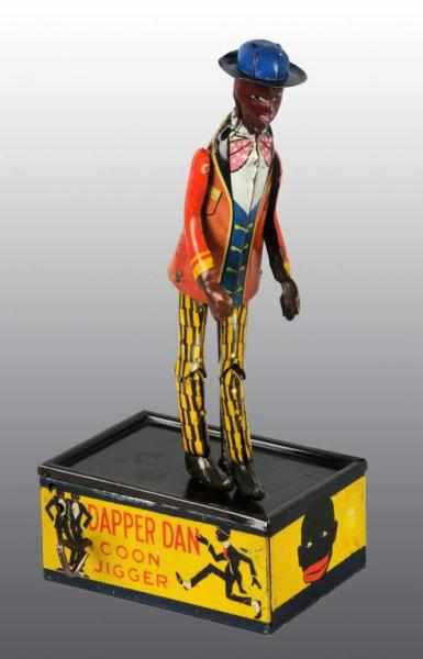 Appraisal: Tin Marx Dapper Dan Roof Dancing Wind-Up Toy Description American