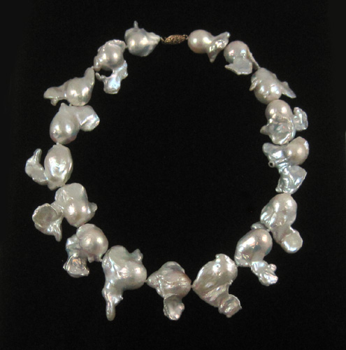 Appraisal: FRESHWATER BAROQUE WHITE PEARL NECKLACE strung with large baroque white