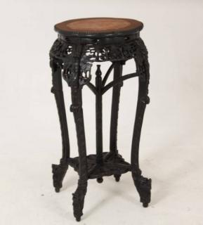 Appraisal: HEAVILY CARVED CHINESE TEAKWOOD STAND HEAVILY CARVED QUATREFOIL SHAPED CHINESE