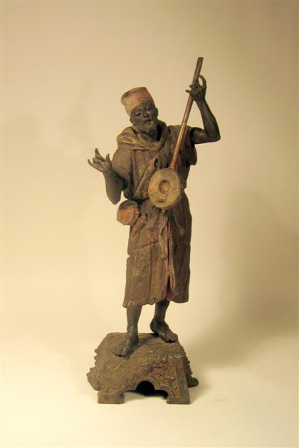 Appraisal: Continental polychrome spelter figure of a Northern African manModeled standing