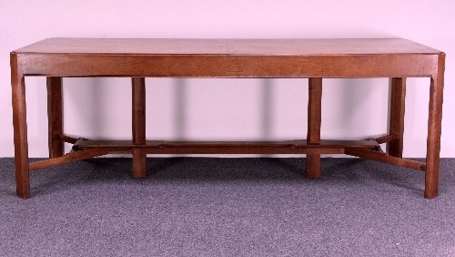 Appraisal: A Gordon Russell walnut dining table the rectangular four-plank top