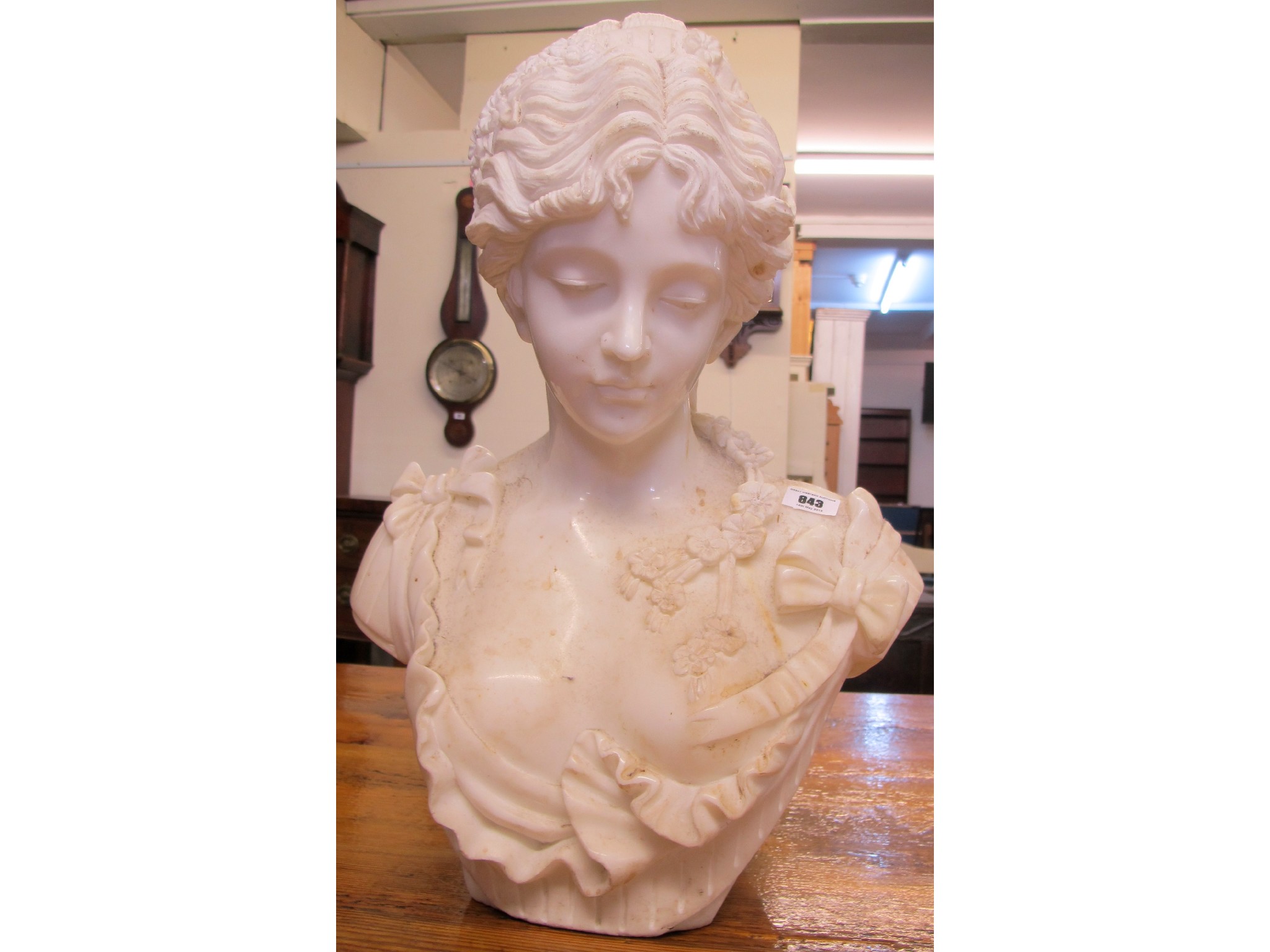 Appraisal: An Italian white marble bust of a woman