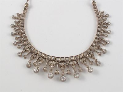 Appraisal: An Edwardian diamond set fringe necklace The graduated circular cut