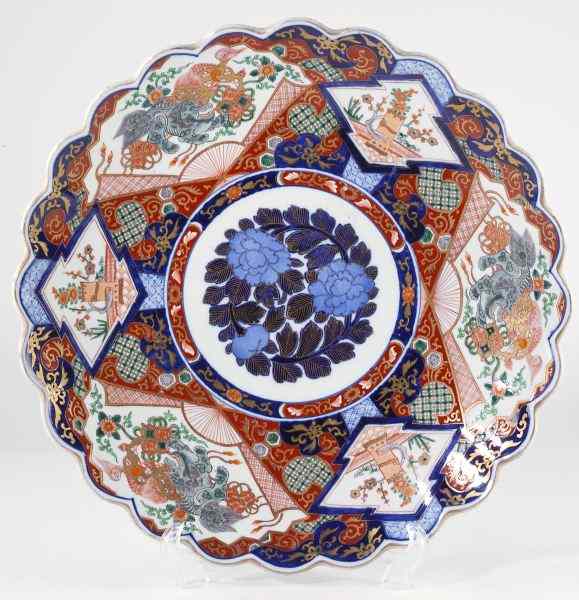 Appraisal: Japanese Imari Chargerlate th century scalloped rim wide border painted