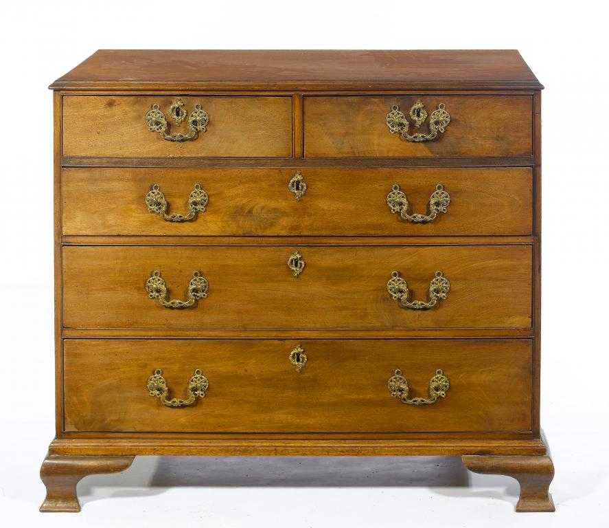 Appraisal: A GEORGE III MAHOGANY CHEST OF DRAWERS with gilt brass