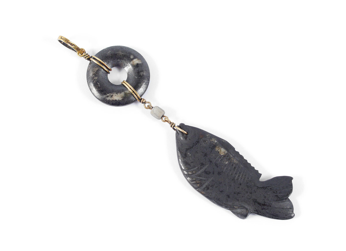 Appraisal: CARTIER JADE FISH PENDANT Carved stone with k yellow gold