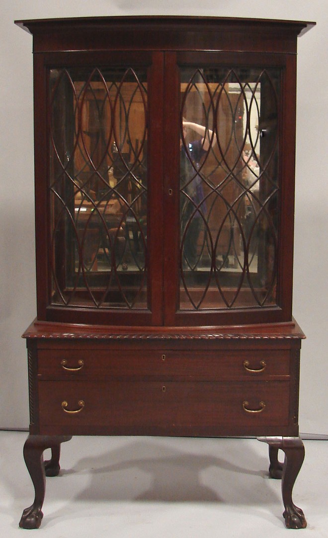 Appraisal: Mahogany two door bow front china closet with mullion doors