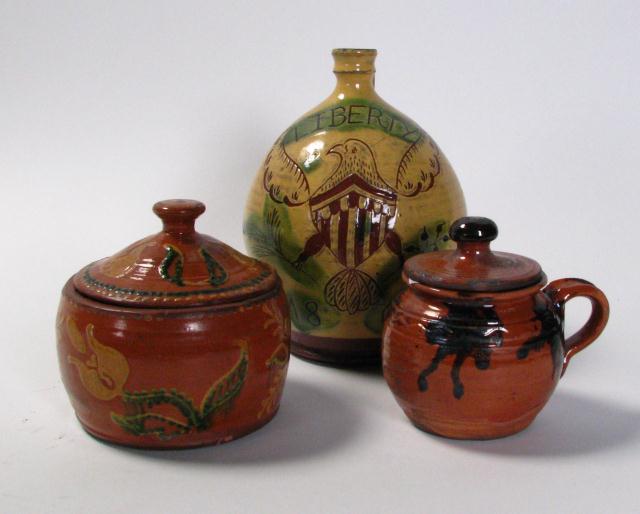 Appraisal: Three decorated Red Ware pottery items including '' handled jug