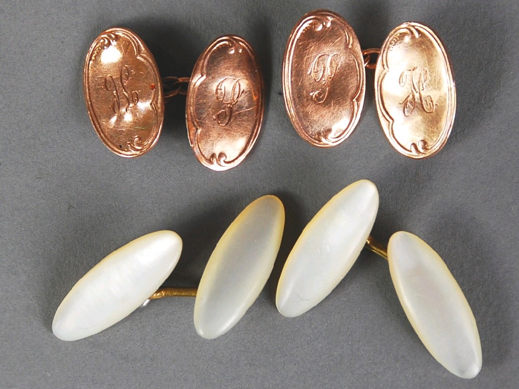 Appraisal: PAIR OF ENGRAVED ct GOLD DOUBLE OVAL CUFF LINKS approx