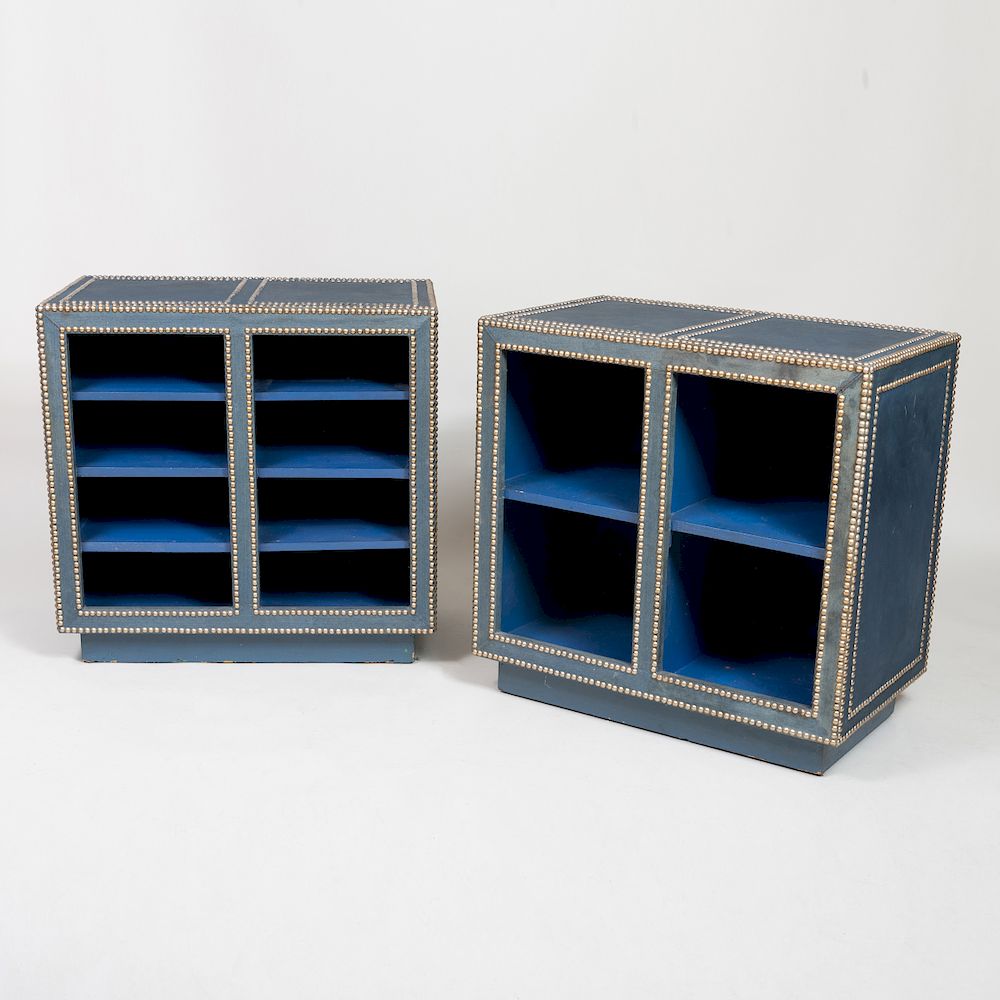 Appraisal: Pair of Studded and Fabric Covered Bookcases of Recent Manufacture