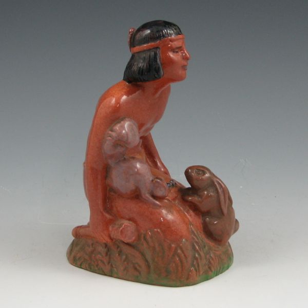 Appraisal: Cleveland Faience Native American Indian figurine with bird squirrel and