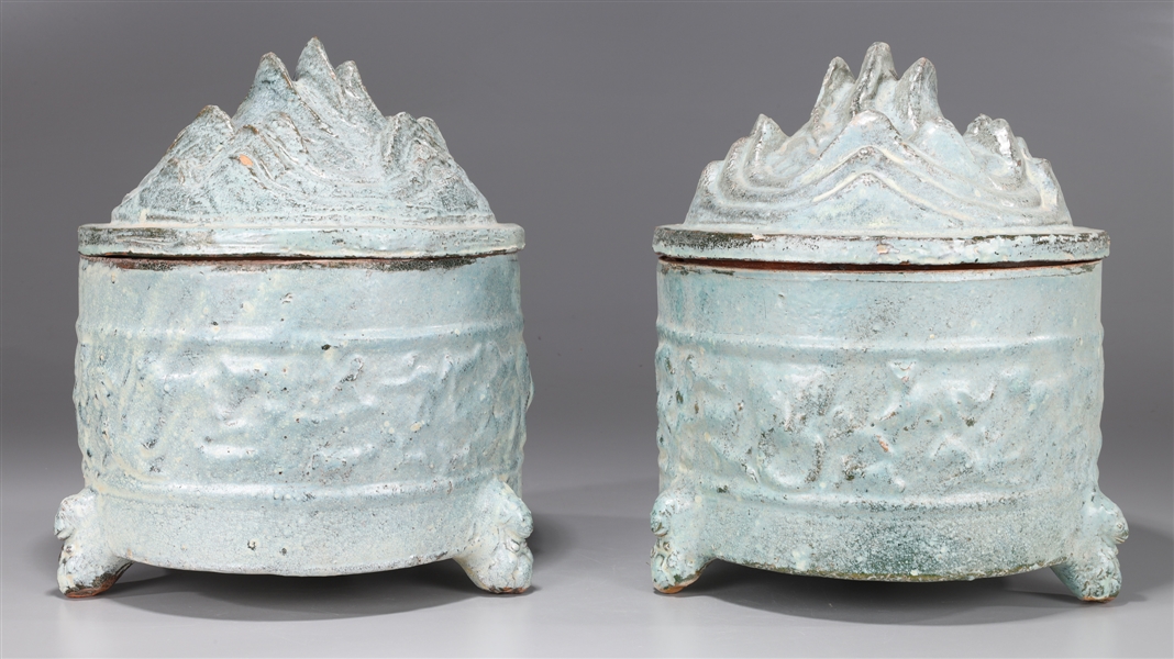 Appraisal: Pair of Chinese hill-topped tripod censers with molded designs to