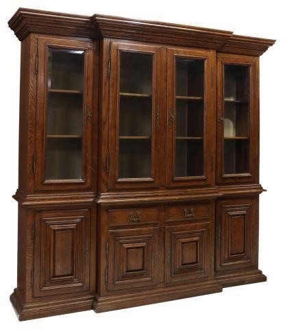 Appraisal: Continental oak breakfront bookcase th c four upper doors with