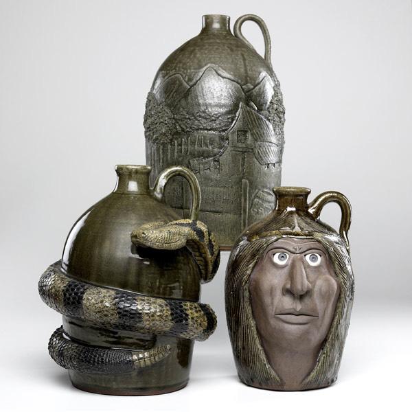 Appraisal: MICHAEL MELVIN CROCKER Three Folk Art jugs one with large