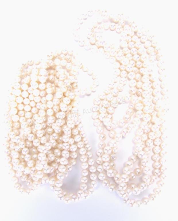 Appraisal: Two extra-long strands of freshwater pearls l and l both