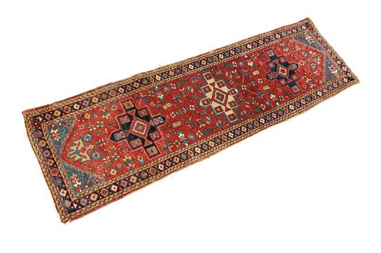 Appraisal: ORIENTAL RUG Ca - Karabaugh runner Three geometric medallions on