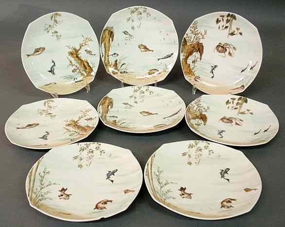 Appraisal: Eight Limoges fish plates of irregular form As found