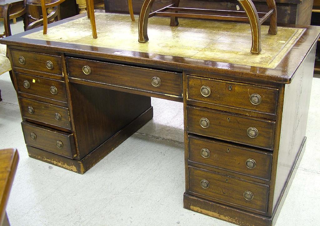 Appraisal: Georgian style mahogany pedestal desk the green tooled leather inset