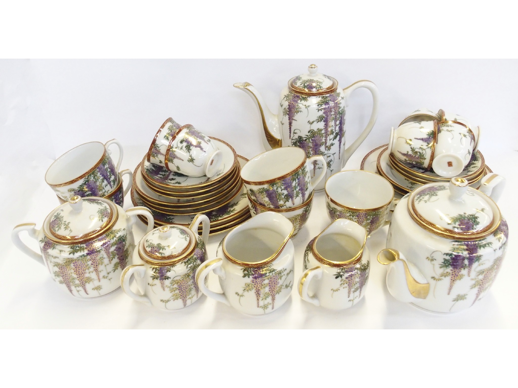 Appraisal: Japanese painted porcelain tea and coffee set for six with