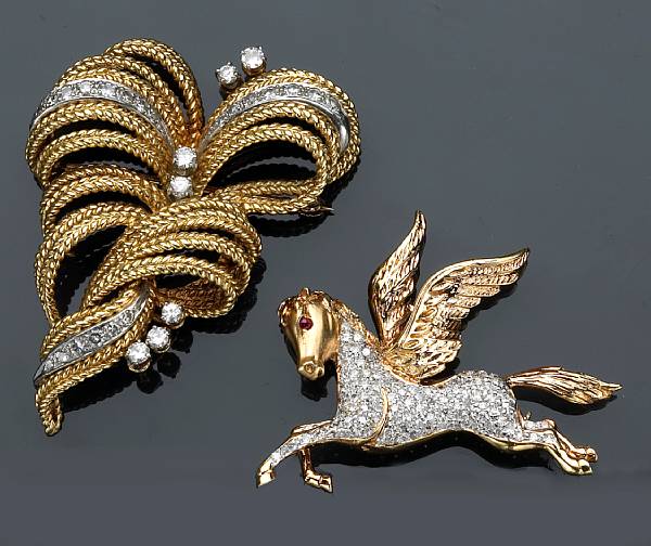 Appraisal: Two diamond brooches one Pegasus motif with a ruby eye