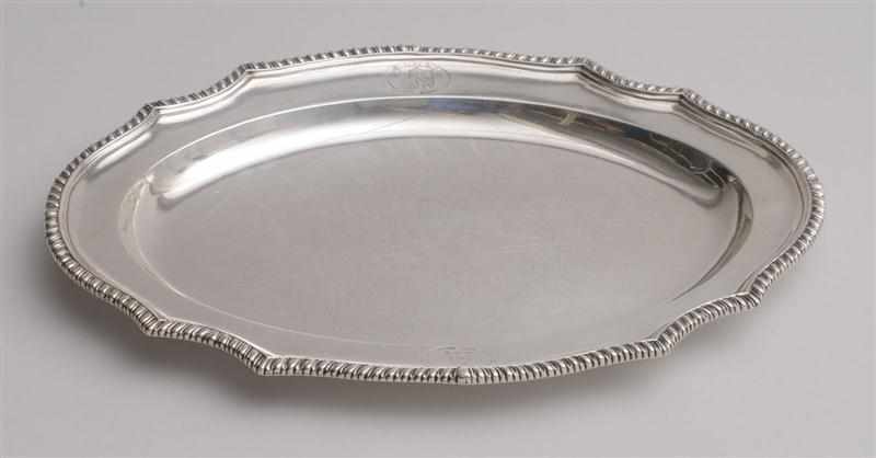 Appraisal: GEORGE III ARMORIAL SILVER SMALL MEAT DISH Maker's mark rubbed