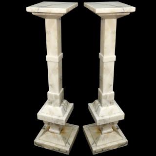 Appraisal: Pair of White Carrara Marble Pedestal Yellow stains needs cleaning