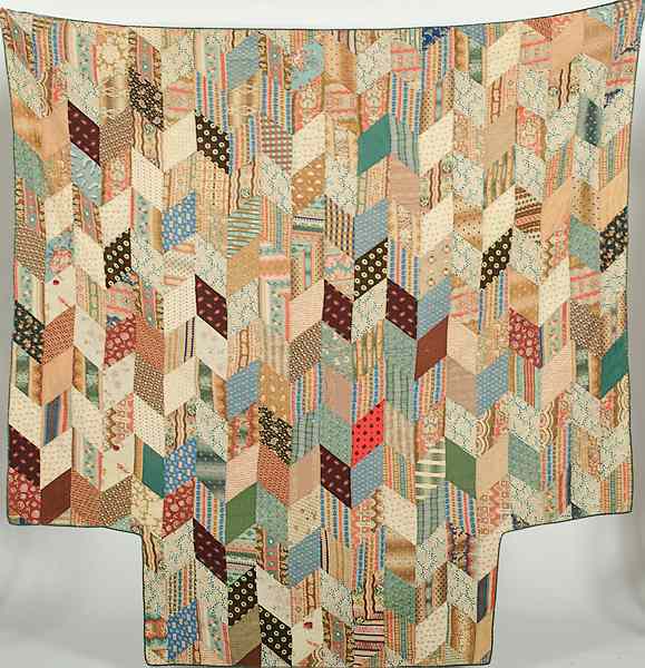 Appraisal: Geometric Quilts American th century Two quilts including one pieced