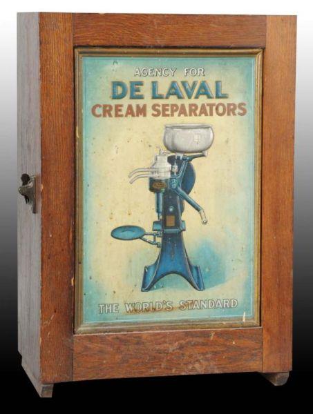 Appraisal: De Laval Cream Separators Tin Litho Oak Cabinet Description Nice