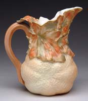 Appraisal: ROYAL WORCESTER DECORATED PITCHER The naturalistic form pitcher made with