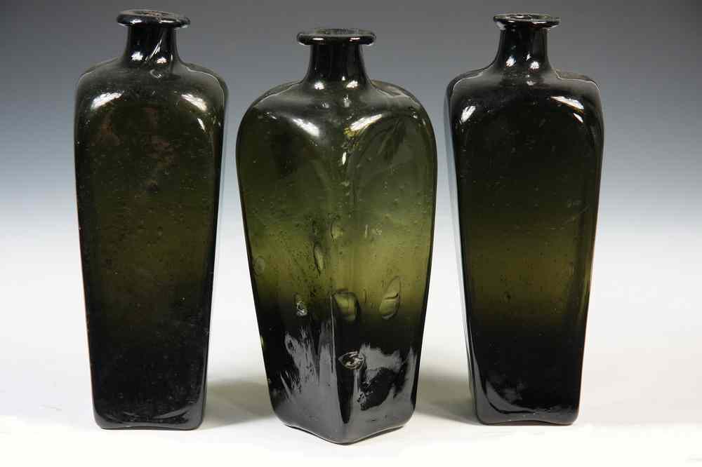 Appraisal: EARLY CASED GLASS BOTTLES - Three Mold Blown Green Glass