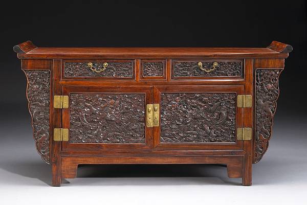 Appraisal: A hongmu coffer cabinet with carved dragon decoration Republican Period