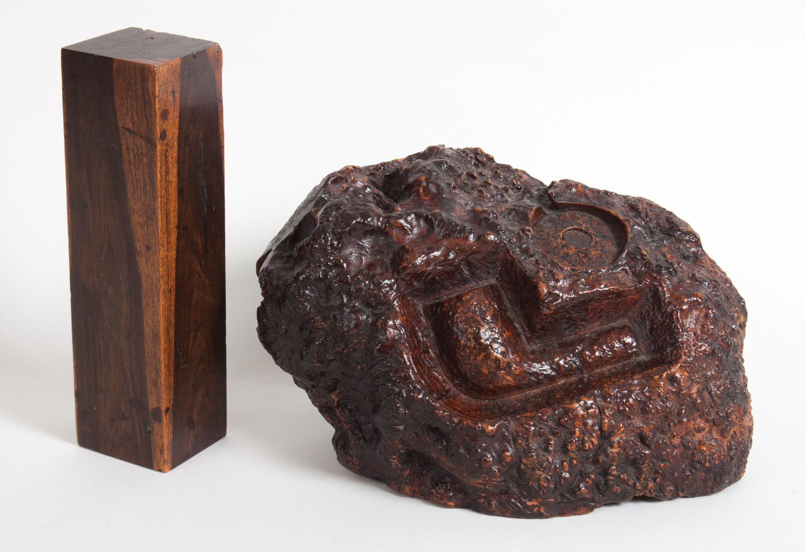 Appraisal: Two wood specimens burl root with carved out pipe in