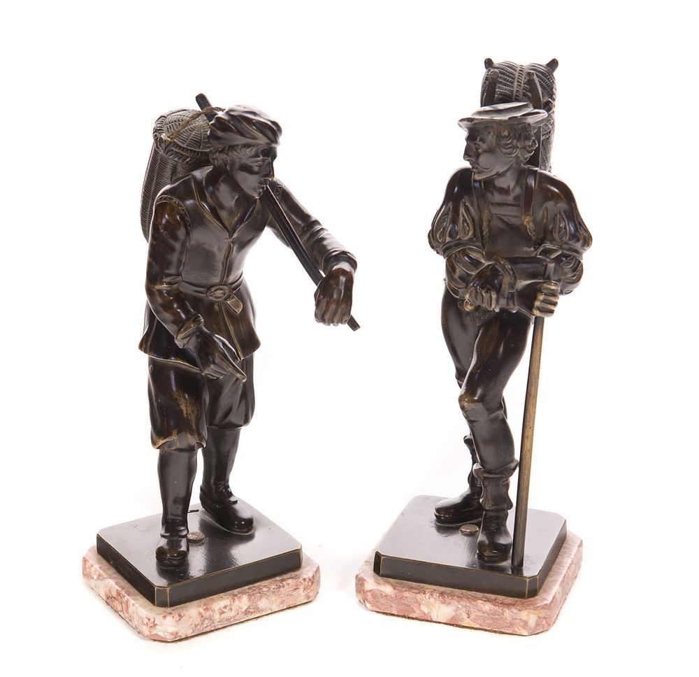 Appraisal: Pair of Bronze Traveler Bronzes with Marble Bases Pair of